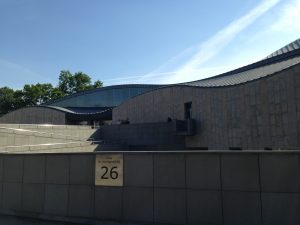 Entrance to Manggha Museum in Krakow, Poland on a sunny day with blue skies